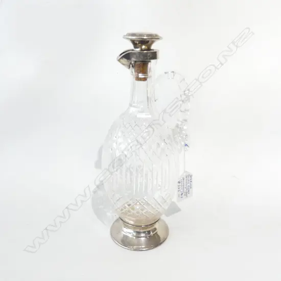 STERLING MOUNTED CRYSTAL DECANTER WITH INTEGRATED POURER. HALLMARK FOR CS? LONDON 1904. H.290mm