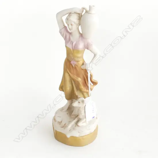 SMALL ROYAL DUX FIGURE OF ' THE WATER CARRIER ' . H. 260mm