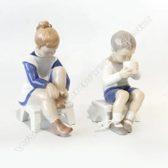 2 B&G DENMARK FIGURINES; BOY DRINKING, GIRL PUTTING ON SHOES H.150mm