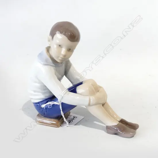 B&G DENMARK FIGURINE; SEATED BOY W.140mm