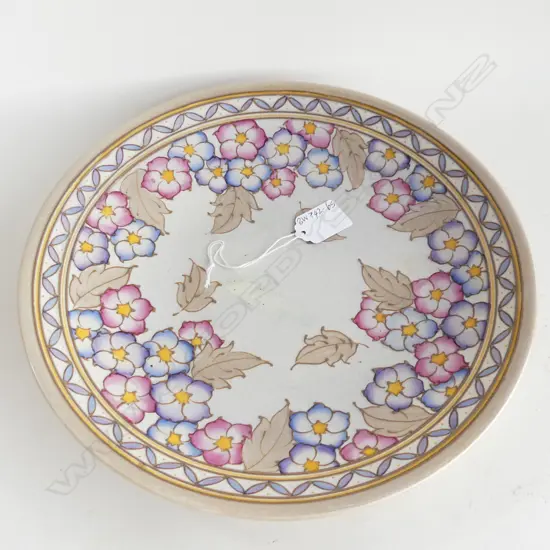 LARGE CHARLOTTE RHEAD CHARGER. GREY COLORWAY LEAF DESIGN. SOME STAINING TO CENTRE.TL 4. DIA. 300mm