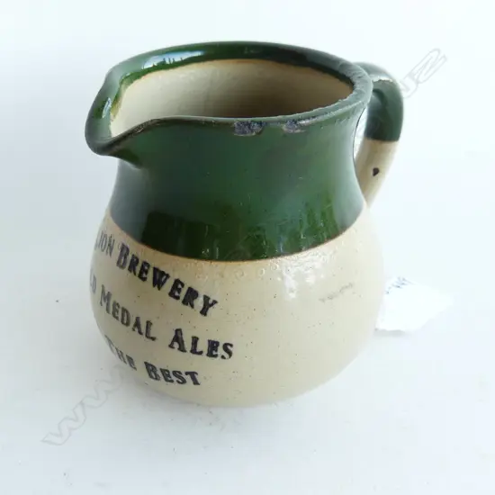 LION BREWERY STONEWARE JUG “LION BREWERY GOLD MEDAL ALES ARE THE BEST” H. 90MM