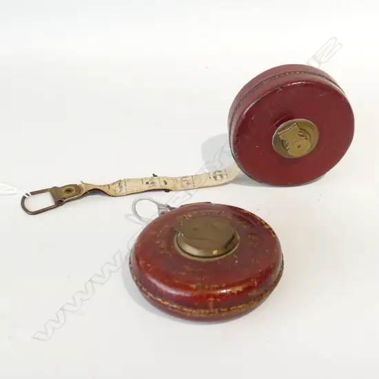TWO LEATHER CASED TAPES WITH BRASS FITTINGS – EDWARD PRESTON & RABONE CHESTERMAN UK D. 90MM