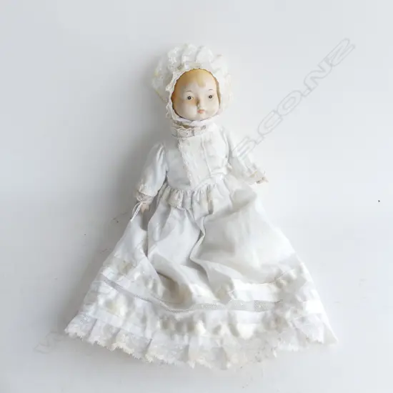 ANTIQUE PORCELAIN DOLL