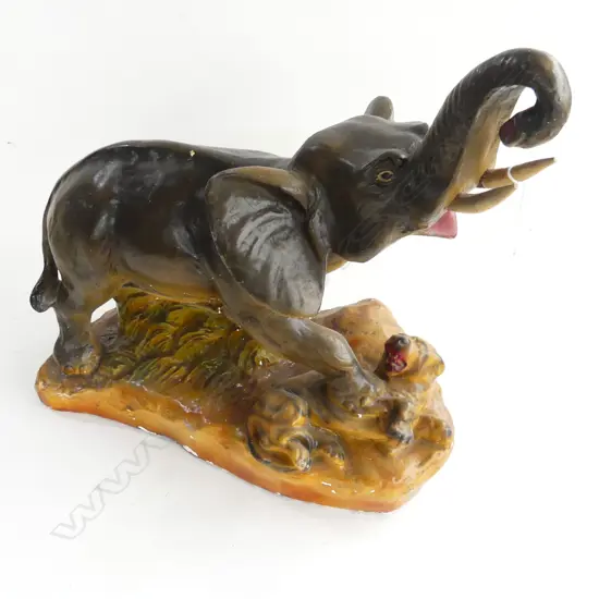 OLD PLASTER ELEPHANT FIGURE WITH LIONS BELOW. W.500 H.400mm