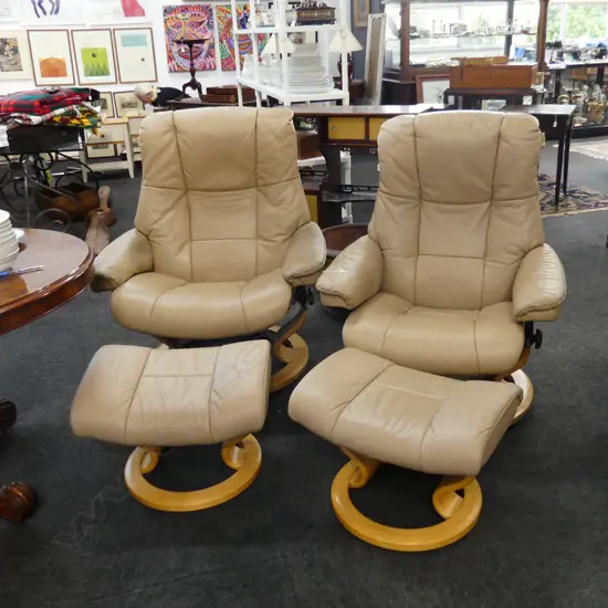 PR BONE LEATHER STRESSLESS RECLINERS WITH FOOTSTOOLS - ROUND WOODEN BASES