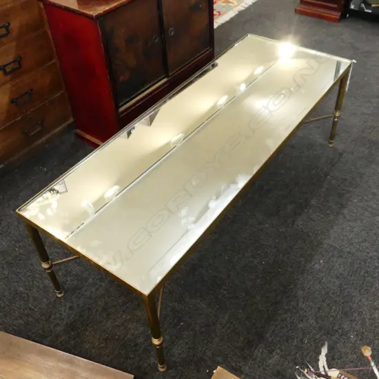 HOLLYWOOD REGENCY BRASS COFFEE TABLE - MIRROR TOP W. 1205 D. 455 H. 405MM