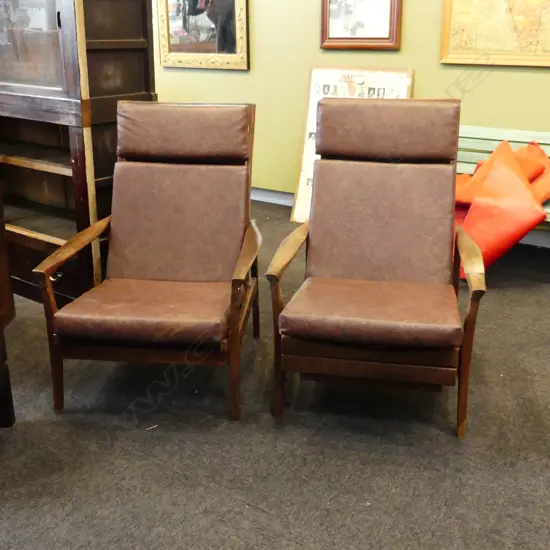 PR BROWN VINYL MID CENTURY RECLINING ARMCHAIRS