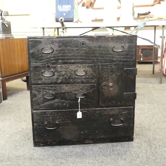 OLD JAPANESE BEDSIDE CABINET. 6 DRAWER (TWO BEHIND DOOR). DARK STAINED. W.550 D. 285 H. 585mm