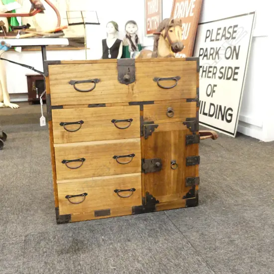 OLD JAPANESE BEDSIDE CABINET. 8 DRAWER ( 3 BEHIND SMALL DOOR ) D.545 W. 320 H. 580mm