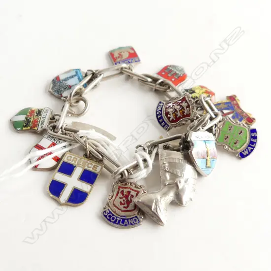VINTAGE TRAVEL CHARM BRACELET WITH SOME STG CHARMS