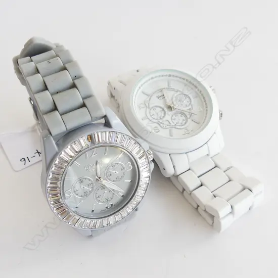 TWO GENEVA WRIST WATCHS - BOTH WORKING ONE WITH CRACKED GLASS