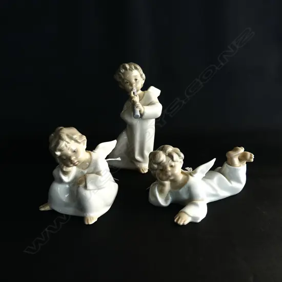 THREE LLADRO CHILDREN  AS AN ANGELS. TALLEST H. 160mm