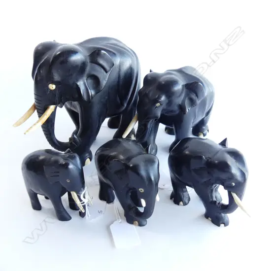 GROUP OF FIVE EBONY ELEPHANTS. GRADUATING FROM H.160mm DOWN TO 60mm . SOME TUSKS BROKEN OR MISSING