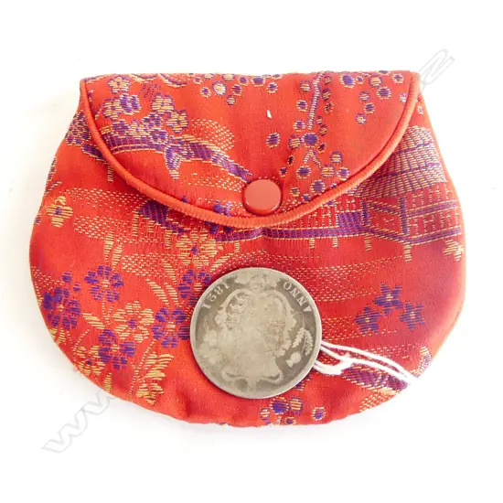 OLD 1821 SILVER COIN. HAS WEAR 