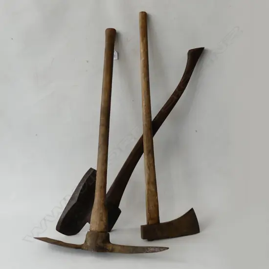 THREE LONG HANDLED TOOLS. TWO AXES AND A GRUBBER.