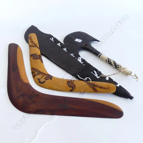 FOUR WOODEN ITEMS. TWO BOOMERANG A MINIATURE AXE CLUB & EBONY CARVED MACHETE.