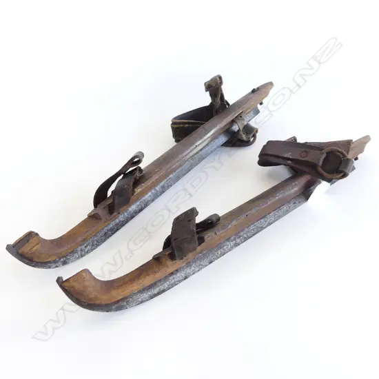PAIR OF VINTAGE WOODEN EUROPEAN ICE SKATES WITH LEATHER AND STEEL FITTINGS L. 390MM  