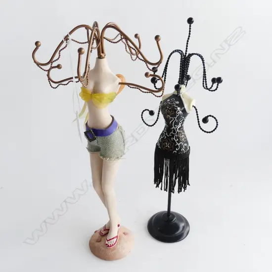 2 FIGURATIVE JEWELLRY STANDS  H 290 MM