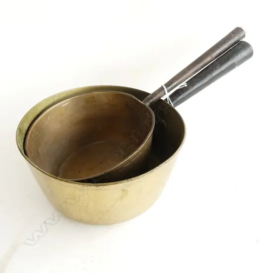 TWO VICTORIAN BRASS SAUCEPANS WITH CAST IRON HANDLES D. 210MM D 180MM