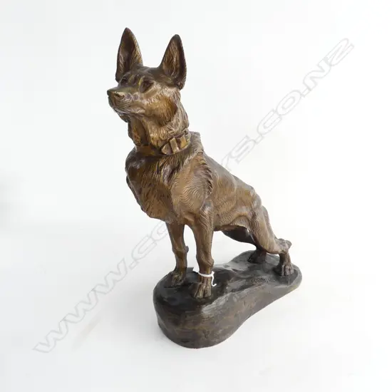 A French bronze figure of a standing Alsatian dog on rocky outcrop