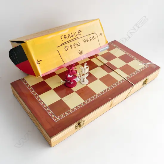 LATE 19THC BONE CHESS SET WITH LATTER WOODEN BOARD ONE QUEEN REPLACED W 400 MM