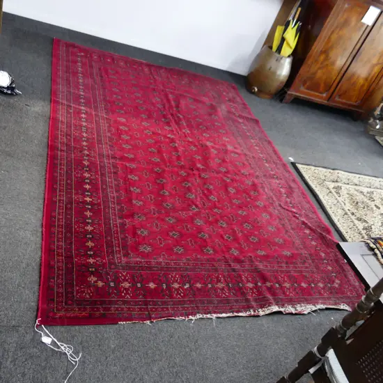 MACHINED RED RUG - damage to one side 2950x1960mm