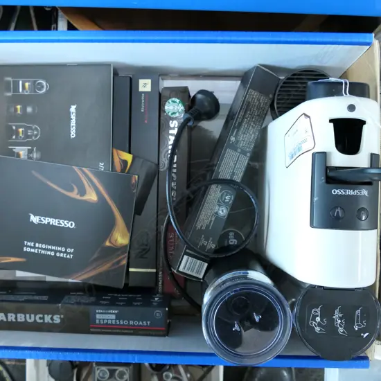 NESPRESSO COFFEE MACHINE w creamer + asst capsules. Ex. Gill Mandeno estate