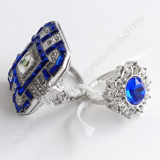2 LG FAUX SAPPHIRE & DIAMANTE DRESS RINGS 