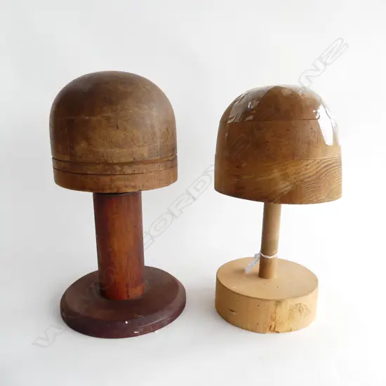 2 OLD WOODEN HAT BLOCKS, ONE WITH METAL FITTINGS, H. 340mm, OTHER ONE PART NEEDS GLUING, H. 330mm