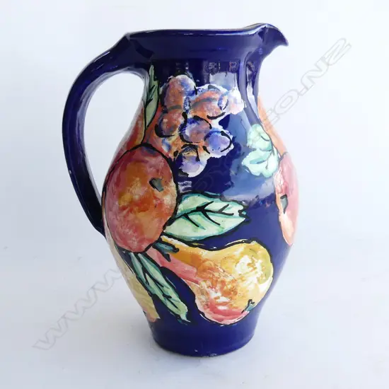 'ESTUARY ARTS GOLDEN BAY' FRUIT PAINTED JUG BLUE GROUND H.245mm