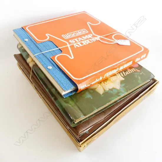 4 VINTAGE STAMP ALBUMS W WORLD COLLECTIONS includes NZ
