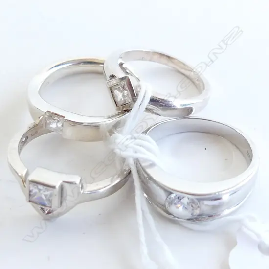4 925 SILVER SOLITAIRE RINGS; WHITE STONES