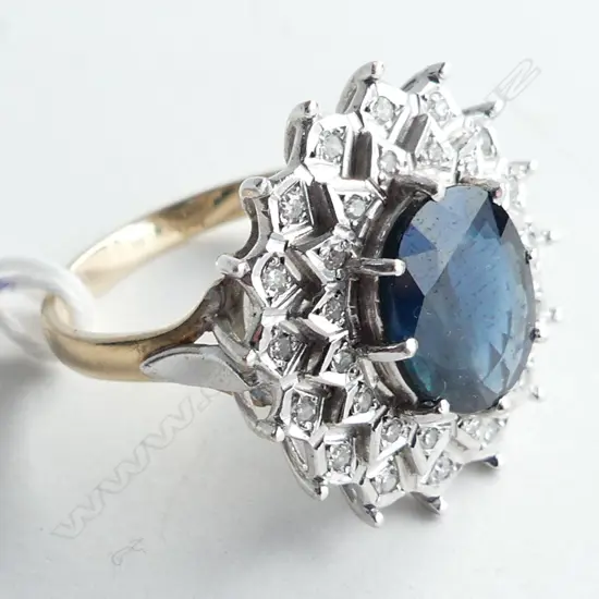 9CT SAPPHIRE & DIAMOND PRINCESS DIANA STYLE RING 5.9 GRAMS