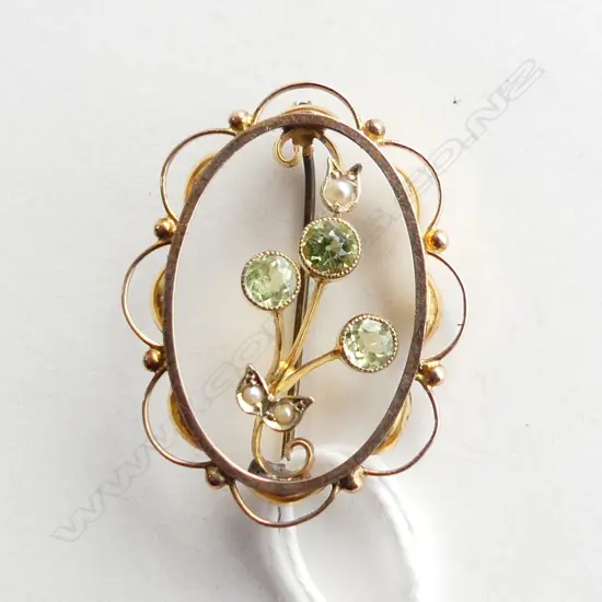 9CT PENDANT BROOCH 2.7GMS floral design w green stones peridots?