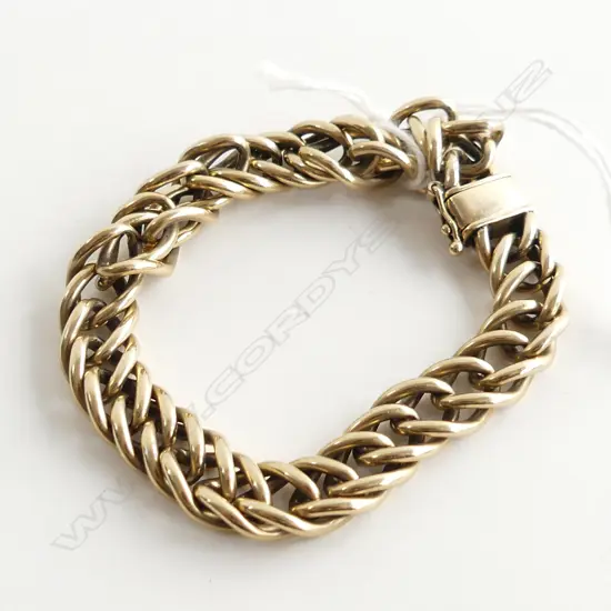 9CT GOLD DOUBLE CURB BRACELET, 33.7GMS