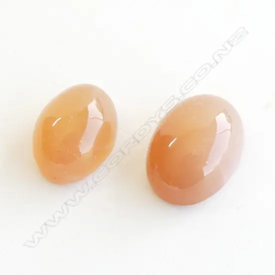 TWO DARK ORANGE MOONSTONES 