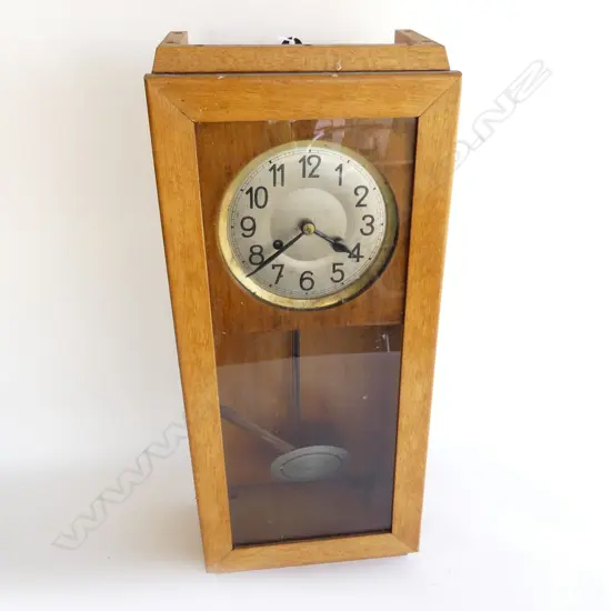 1920S BLONDE OAK LONG RECTANGULAR WALL CLOCK. H.660mm