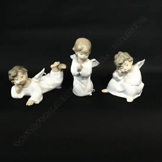 THREE LLADRO FIGURES OF PUTTEE.TALLEST H. 130mm