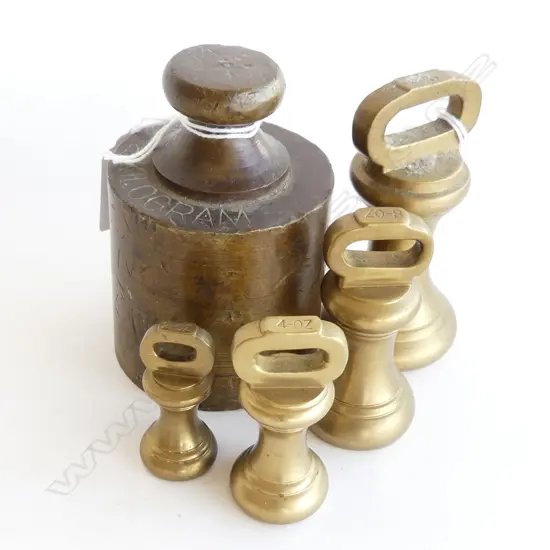 4 GRADUATED BRASS WIEGHTS   LARGEST 90MM  & 2KG BRASS WIEGHT