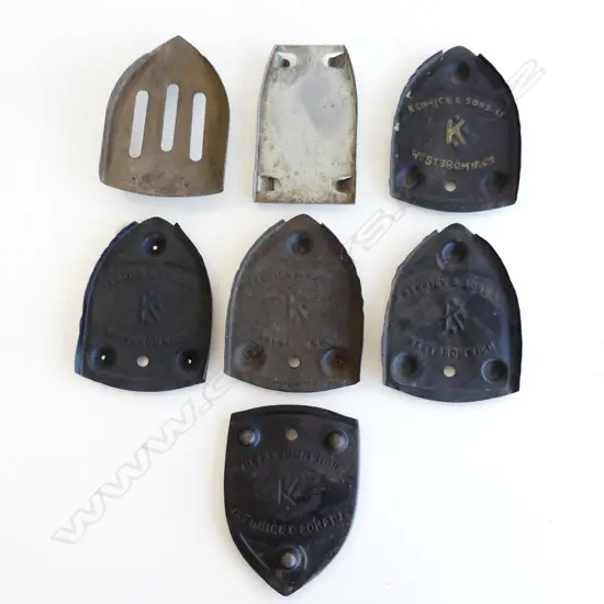 FIVE KENRICK & SONS WEST BROMWICH IRON TRIVETS & TWO OTHERS (7 ITEMS)