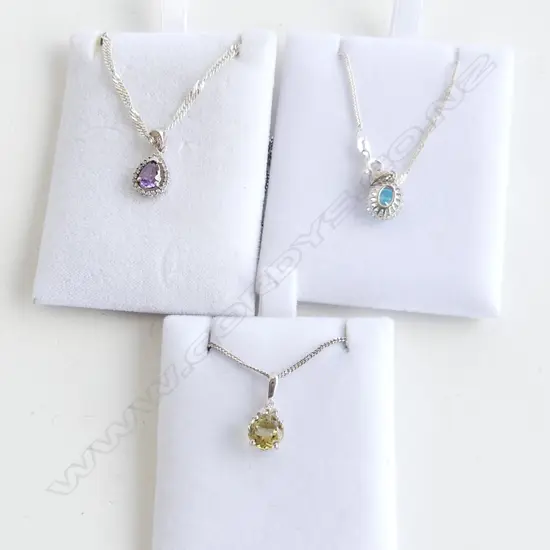 3 925 SILVER PENDANT NECKLACES; PALE BLUE, PALE YELLOW, PURPLE