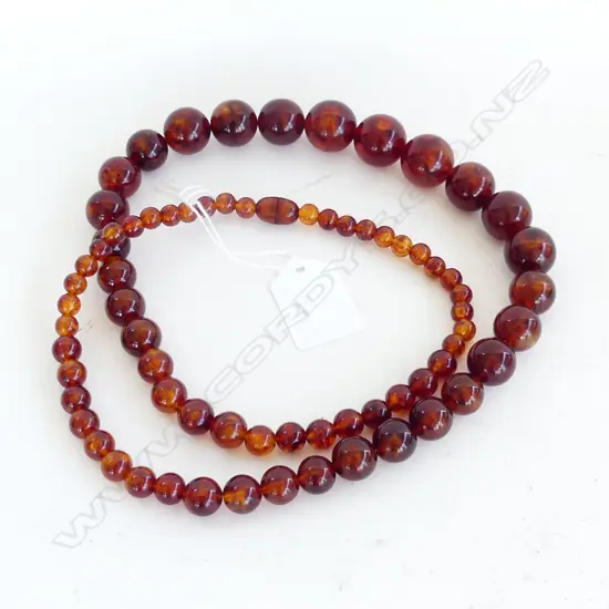 VINTAGE STRING GRADUATED AMBER STYLE BEADS 680mm.