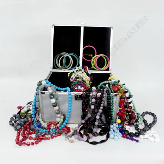 LG METAL CASE FULL OF VINTAGE PLASTIC COSTUME JEWELLERY 1960's, 70's & 80's