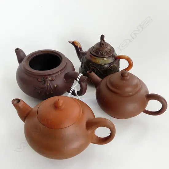 4 TEAPOTS; 3 ZISHA, 1 CARVED STONE