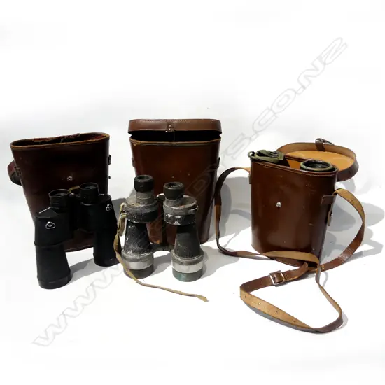3 PRS VINTAGE BINOCULARS IN TALL BROWN LEATHER CASES H.270mm...