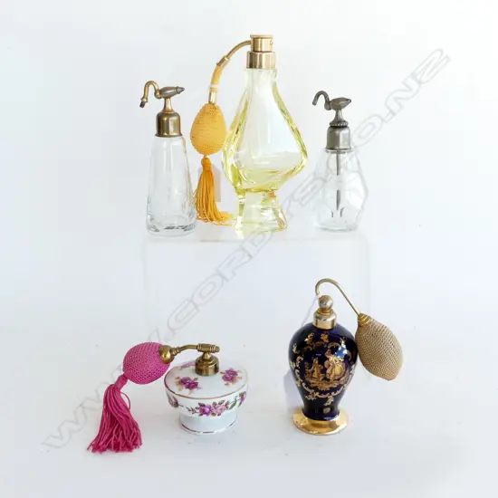 FIVE CHINA AND GLASS PERFUME BOTTLES
