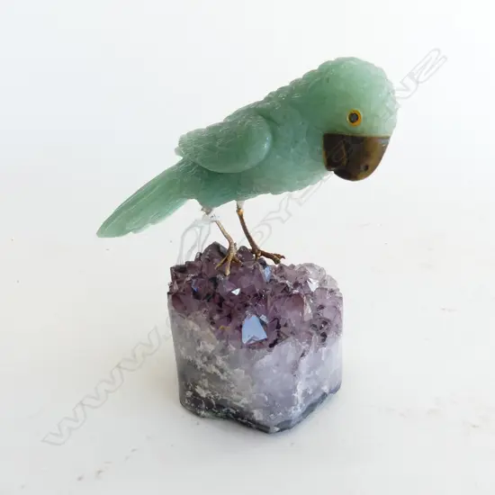 CARVED GREEN STONE PARROT ON AMETHYST GEODE BASE H.100mm