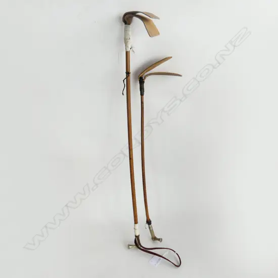 2  ANTIQUE METAL CAPPED RIDING CROPS L.715, 575mm