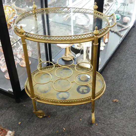 VINTAGE OVAL BRASS DRINKS TROLLEY 